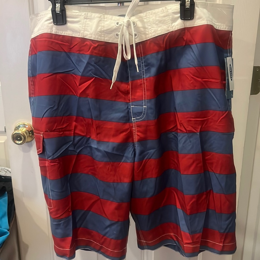 Old Navy Mens 10” Board Shorts at the knee.